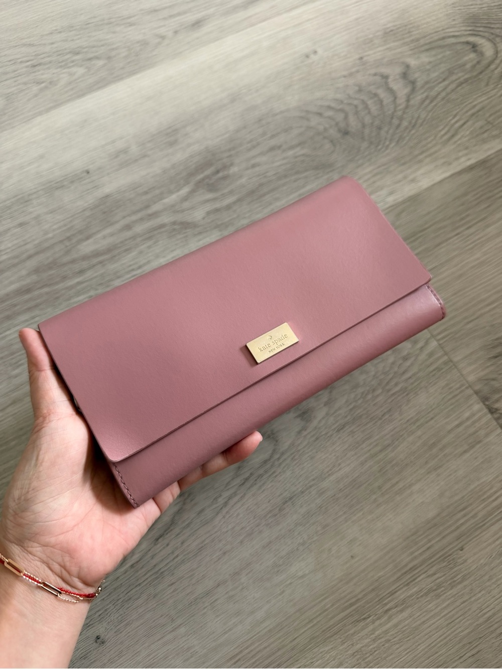 kate spade rose pink leather flap clutch with gold logo plaque